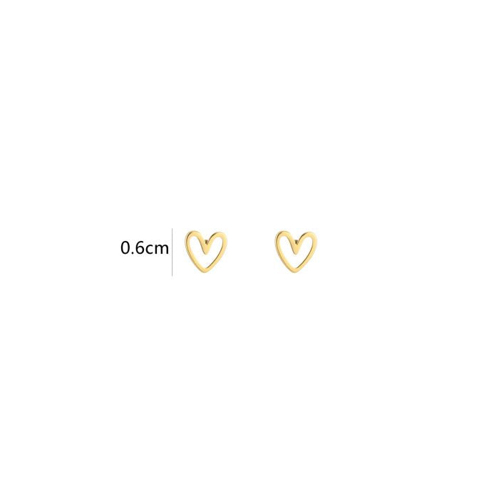 Minimalistische gouden hartjes studs| Jewellery by Marie kleine gouden studs